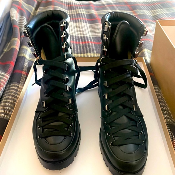 Christian Louboutin flat combat boots. Size 38 in excellent shape. Barely worn.